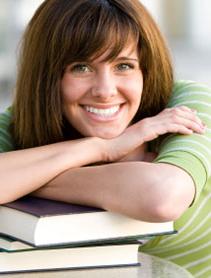业务 & Auxiliary Services photo of female college student with books